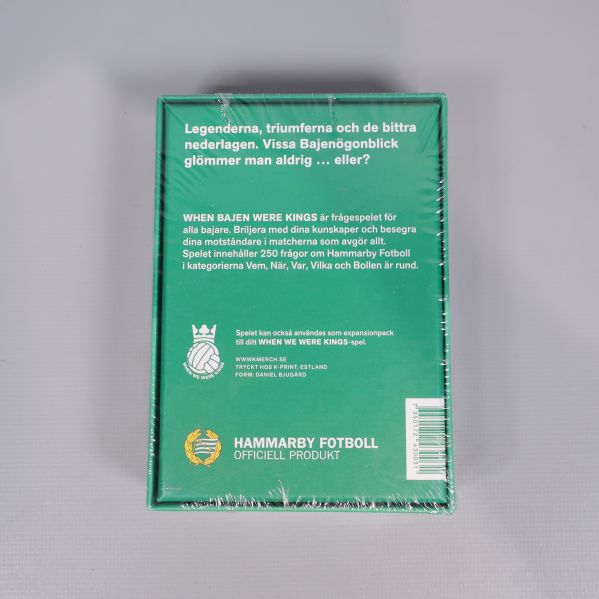 Baksidan av spelask med beskrivning av frågespelet