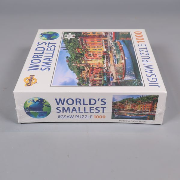 Sidan av pusselask med text World's Smallest och Portofino-motiv