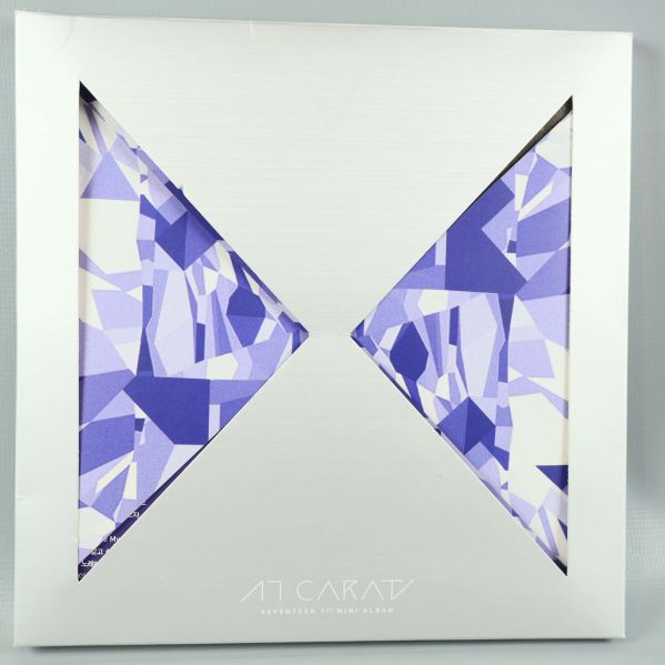 Framsida på K-pop album med geometriskt motiv