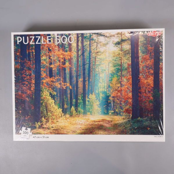 Pusselbox med motiv av solig höstskog