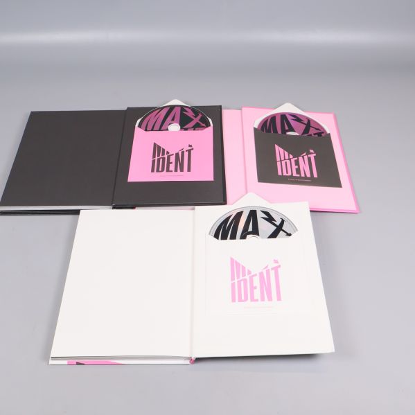 MAXIDENT-album öppna med runda inslag och grafisk design