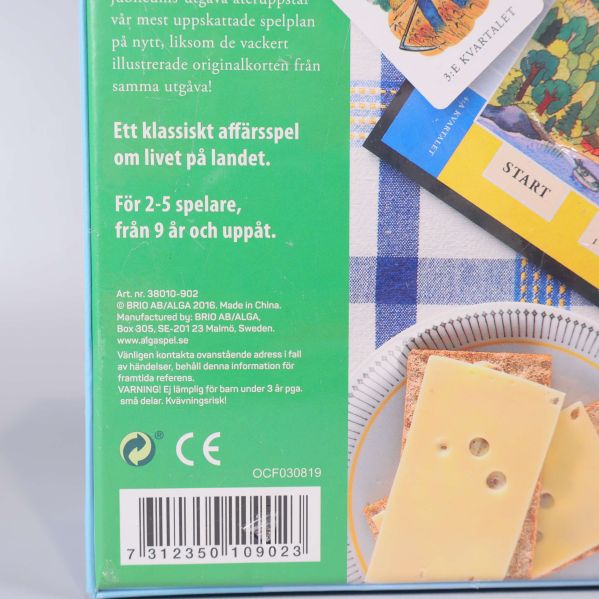 Närbild baksidan av Bondespelet med spelare, ålder och spelarinformation
