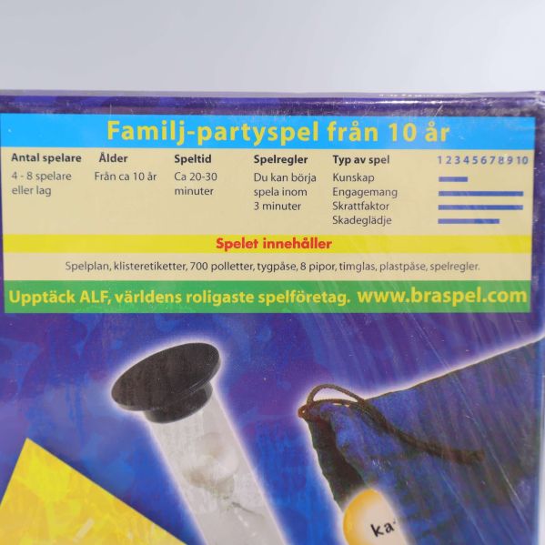 Detaljbild på baksidan med spelregler och innehåll