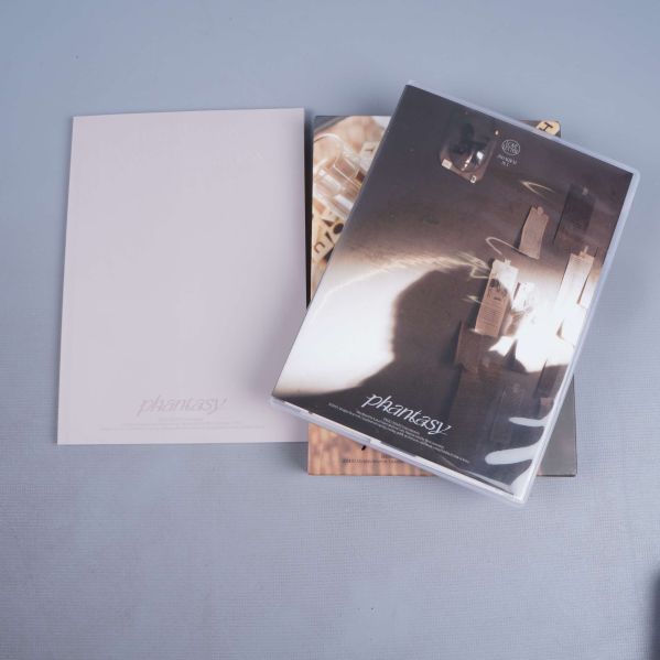 Album med separata fotobok och genomskinligt skyddsfodral