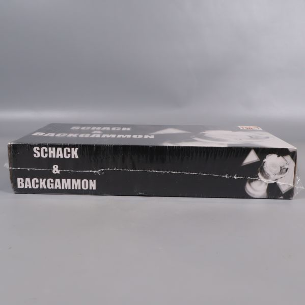 Sida av box med schack och backgammon text