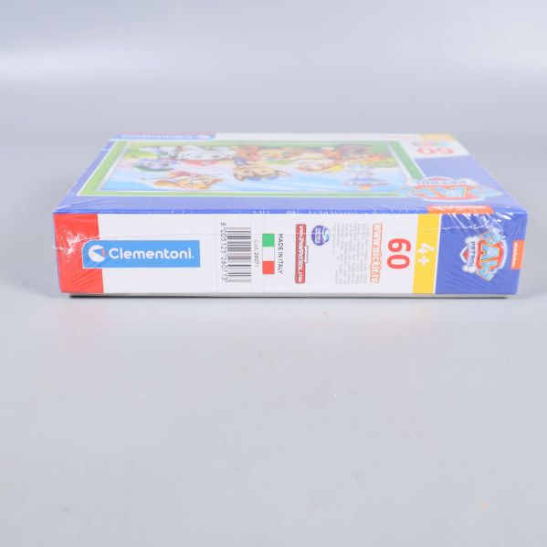 Sidovy av Paw Patrol pusselask med Clementoni-logotyp och banderoll