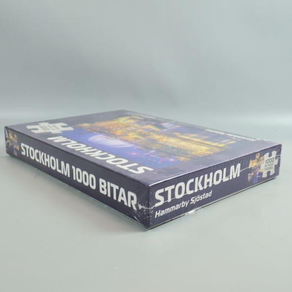 Sidovy av pusselasken med texten 1000 bitar