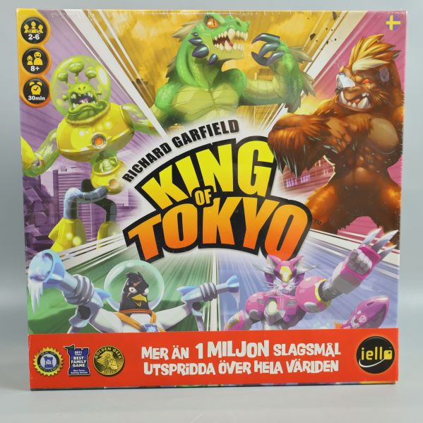 Framsidan av King of Tokyo med tecknade monster