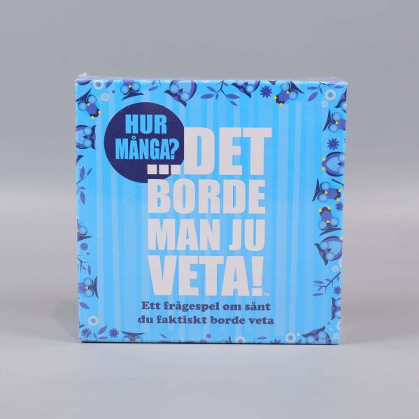 Framsidan av blå frågespelsbox med stor text