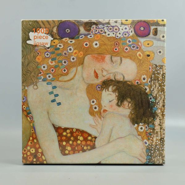 Framsida av pussellåda med motiv av Gustav Klimt och 1000 piece-märke