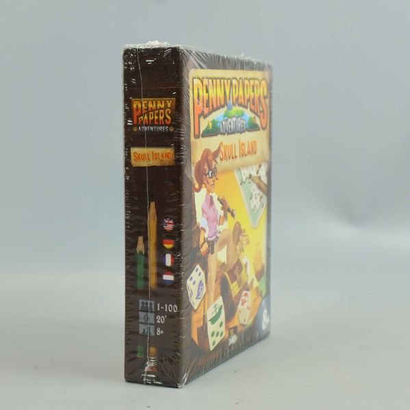 Sidosikt av spelboxen Penny Papers Skull Island