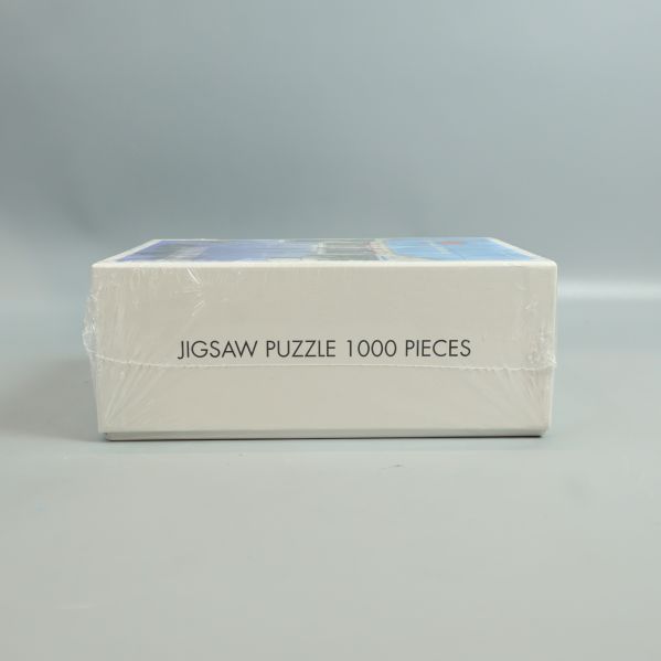 Sida av låda med texten Jigsaw Puzzle 1000 pieces