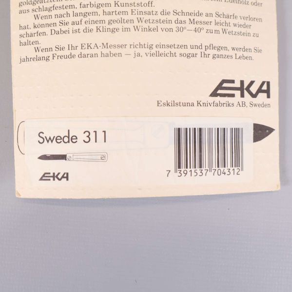 Närbild på baksidan av förpackningen med text Swede 311 och EKA