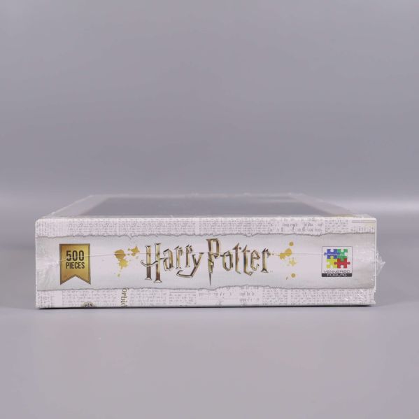 Undersidan av Harry Potter-pussellådan med detaljer