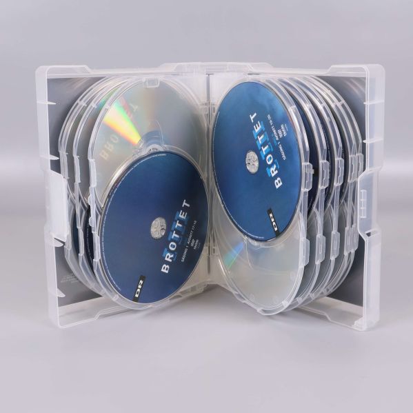 Öppen DVD-box med 17 skivor till Brottet organiserade inuti