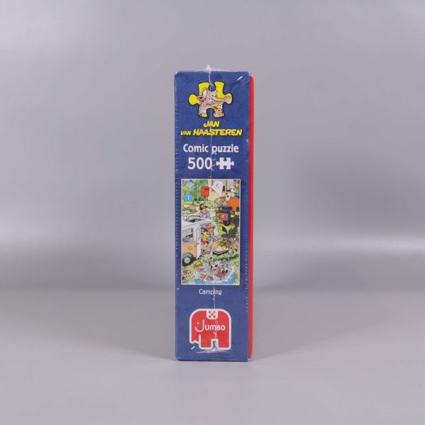 Sida av comic puzzle 500 bitar med motiv och logotyper