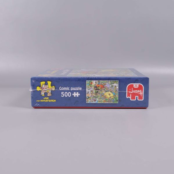 Undersida av comic puzzle visar motiv och logotyp