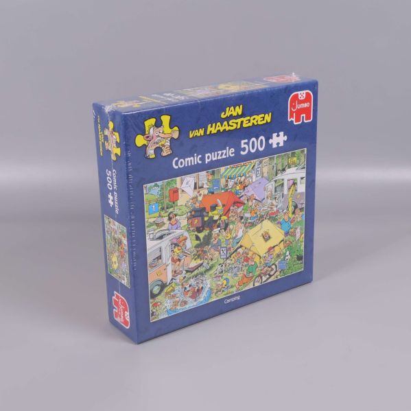 Vinklad vy av comic puzzle 500 bitar i förpackning
