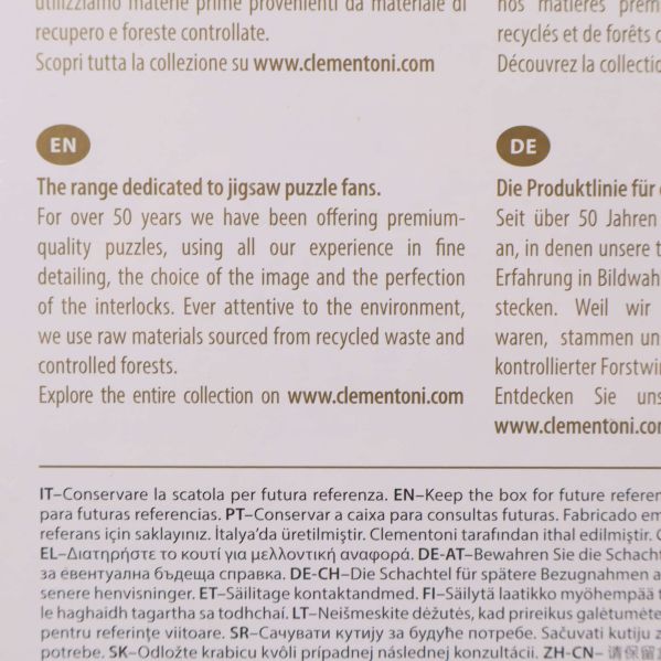 Närbild av baksidan med engelsk och tysk text om pusslets kvalitet