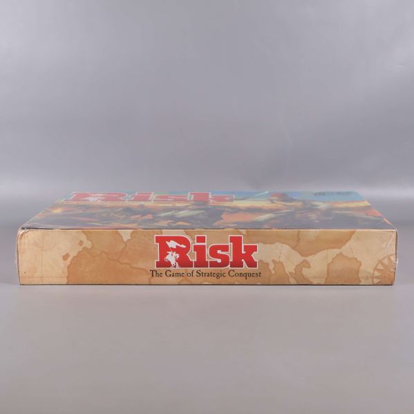 Risk långsida med logotyp och förpackningsdetaljer