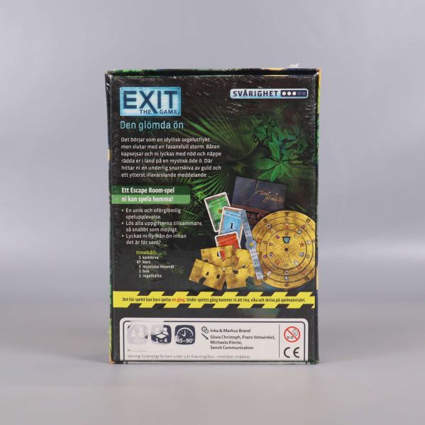 Baksidan av Exit The Game Den glömda ön med spelbeskrivning och komponenter