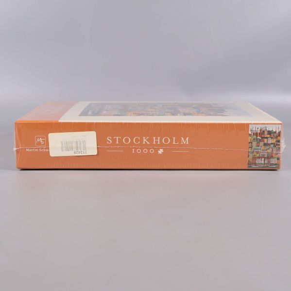 Långsida av pusselask med Stockholm 1000 text