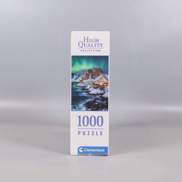 Sidan av pusselask med motiv och text 1000 puzzle