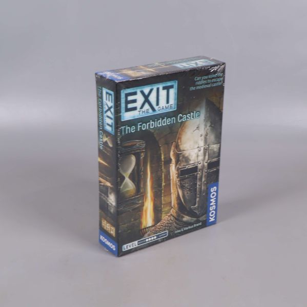 Sned vy av Exit The Game The Forbidden Castle med framsidan uppåt