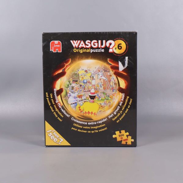Framsidan av Wasgij Original 6 pusselbox med motiv och logotyp