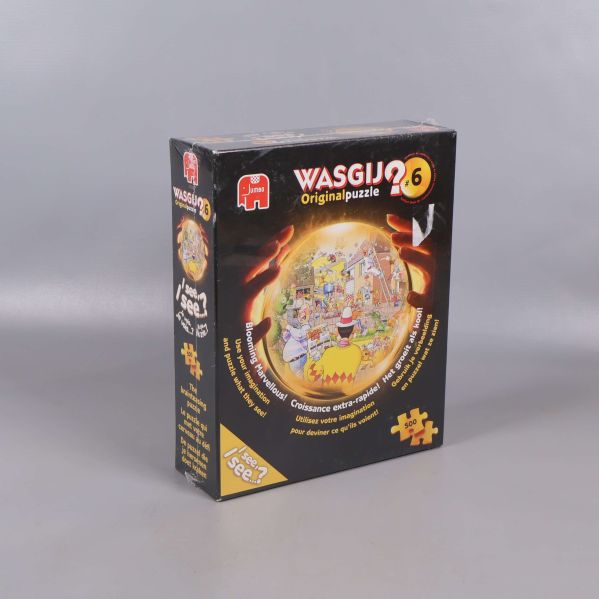 Sned vy av Wasgij originalpusselbox med färgglatt motiv