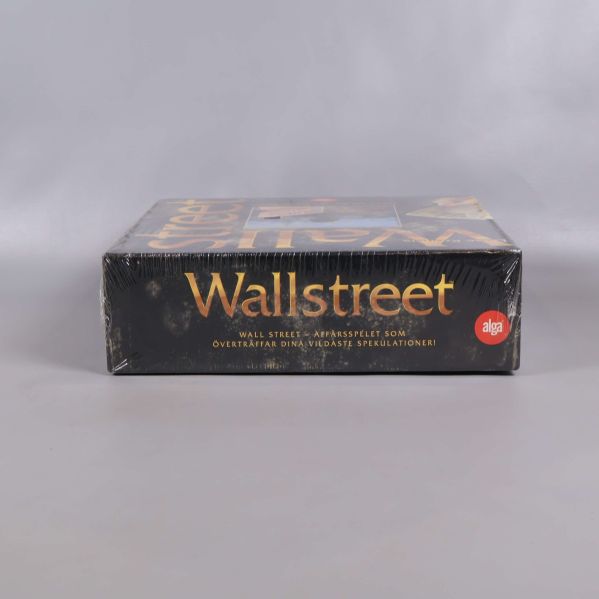 Wallstreet spelask sedd från sidan med text och logotyp