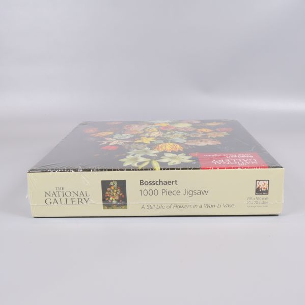 Sida av ask med 1000 Piece Jigsaw och titel