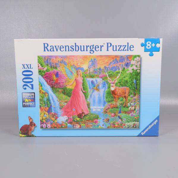 Framsida av Ravenburger-pussel med älva och djur i naturen