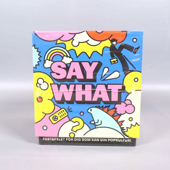 Say What partyspel med blå framsida och popkulturella motiv