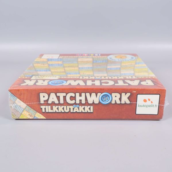 Patchwork spelask sedd från sidan med logotyp