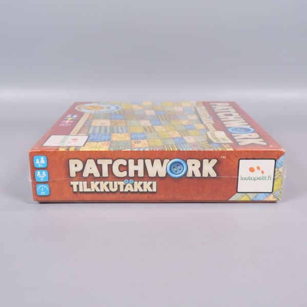 Patchwork spelask från smal sida med logotyp