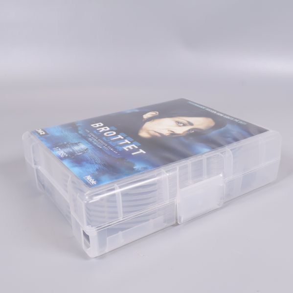 Stängd Brottet-box med transparent plastfodral