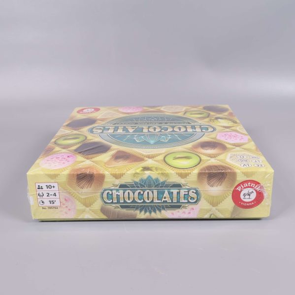 Sidan av Chocolates med spelinformation och röd logga