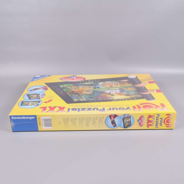 Sidan av XXL Roll your Puzzle låda vänd mot vänster