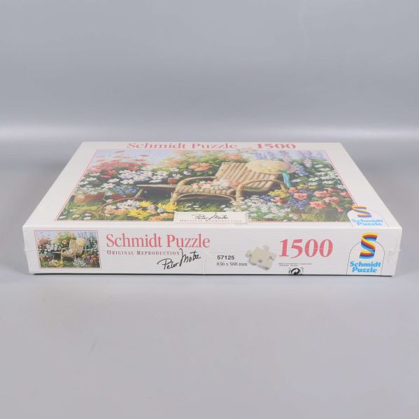 Framsida av pussellåda med Schmidt Puzzle logotyp och 1500 bitar