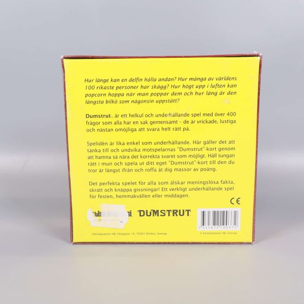 Baksidan av Dumstrut spelet med spelbeskrivning och detaljer