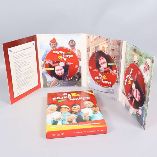 Öppen DVD-box med tre diskar synliga i fodralet