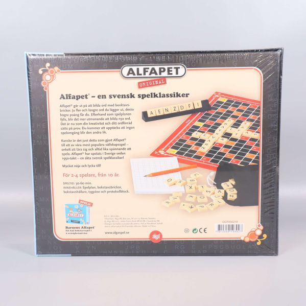 Baksidan av Alfapet med spelplan, brickor och beskrivning