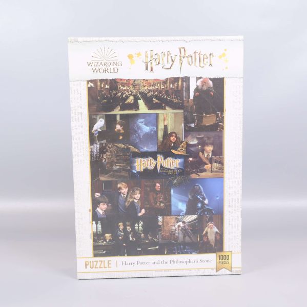 Framsidan av Harry Potter pussel med flera klassiska filmscener