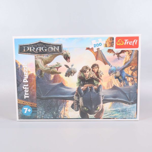Dragons-pussel med förpackning synlig framifrån