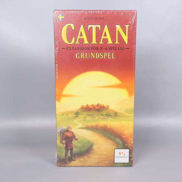 Catan grundspel stående med tydlig framsida och solnedgång
