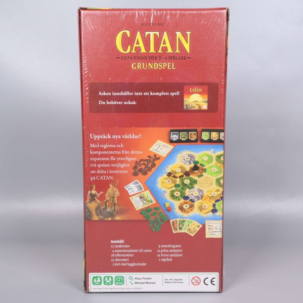 Baksidan av Catan grundspelets låda med spelplan och innehåll