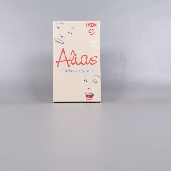 Framsida av Alias ordspelsask med glad ansiktsillustration