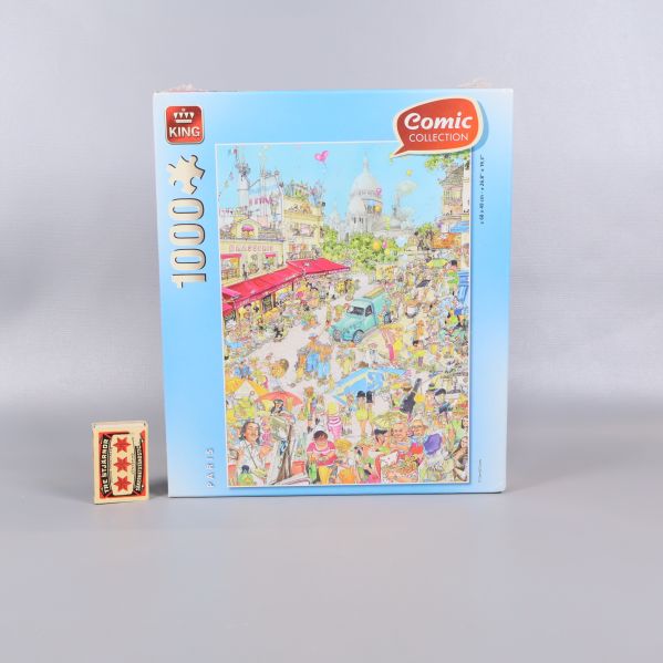 Comic Collection Paris pussel bredvid tändsticksask för storleksjämförelse