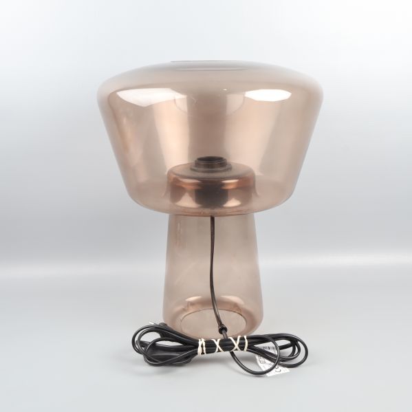 Baksida av lampa i brunt glas med enkel sladd
